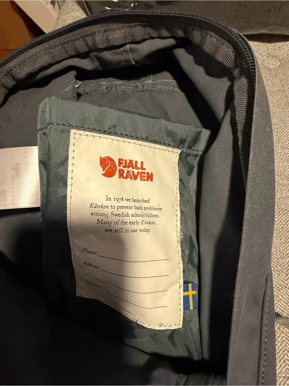Fjallraven Kanken Classic Backpack in Black with Red Logo